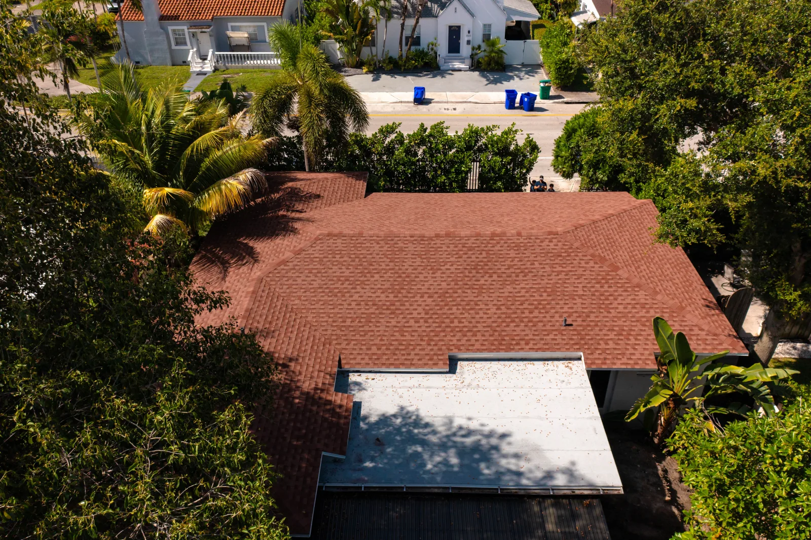 Professional aerial view of a completed architectural-shingle roof from the Acosta project archive.