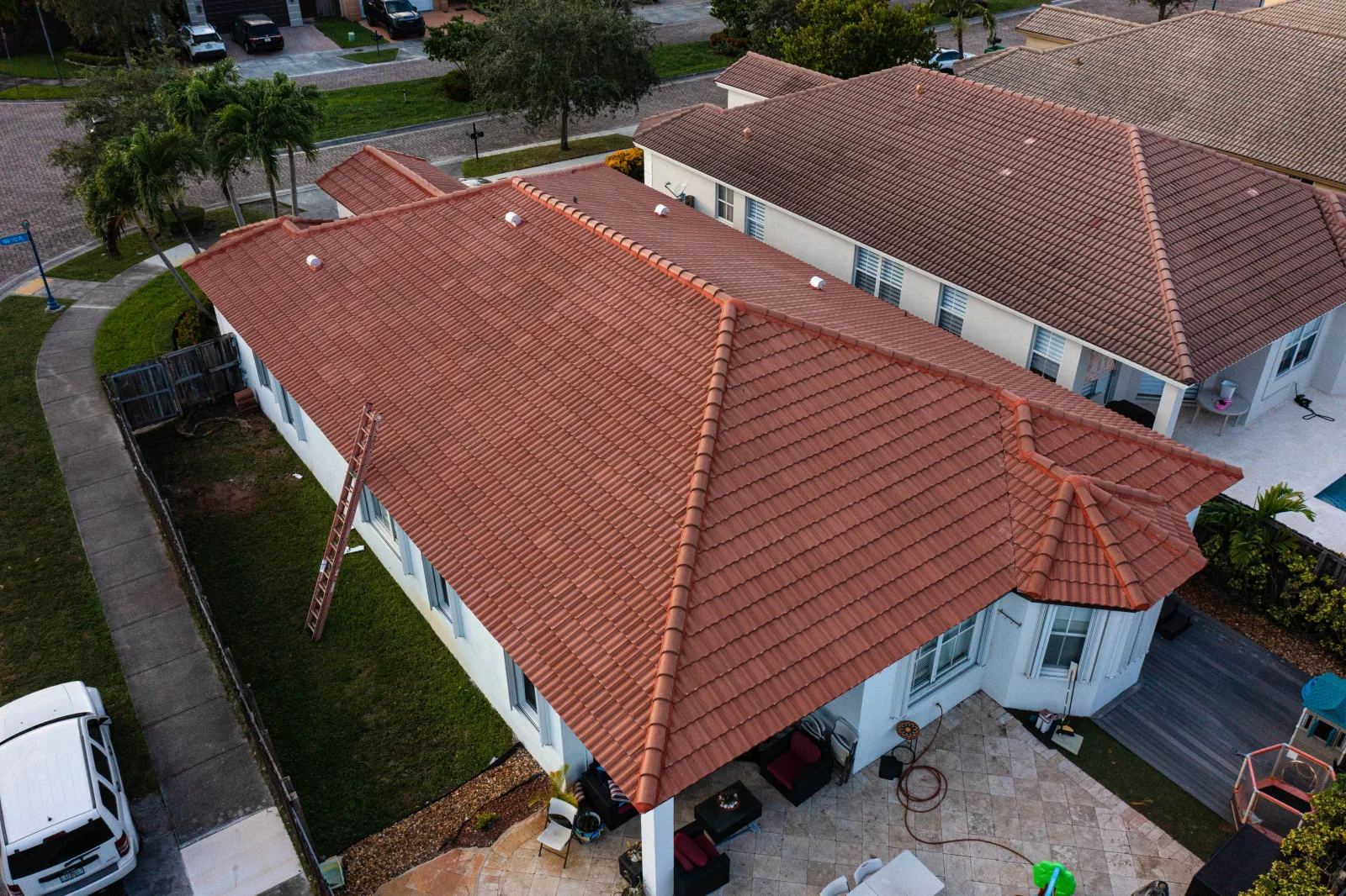 Professional aerial view of a completed South Florida tile roof from the Acosta project archive.