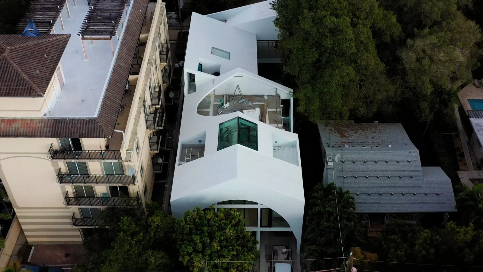 Completed rooftop terrace and folded roof planes at Leslie House in Little Havana.